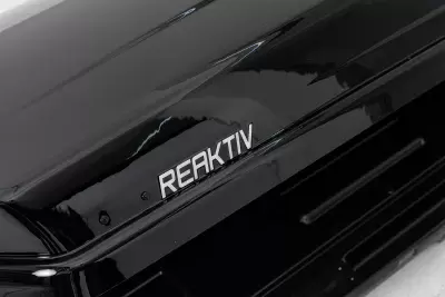 Автобокс REAKTIV Bolid 520 черный глянцевый двустороннее 700 л от интернет-магазина AUTOBOKS.kz. 