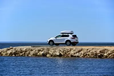 Автобокс на крышу PT-Group Аэродинамический "ACTIVE М" Белый ДВУСТОРОННЕЕ открывание от интернет-магазина AUTOBOKS.kz. 