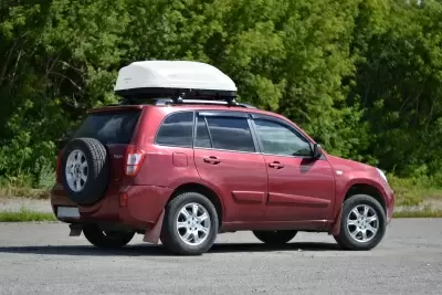 Автобокс на крышу Белый Turino Compact Аэродинамический от интернет-магазина AUTOBOKS.kz. 