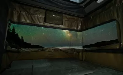 Автоматическая подъемная крыша Wild Land для пикапа с палаткой от интернет-магазина AUTOBOKS.kz. 