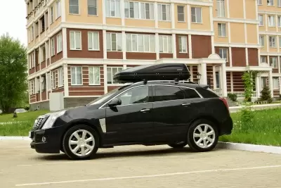 Автобокс на крышу PT-Group Аэродинамический "ACTIVE М" Черный ДВУСТОРОННЕЕ открывание от интернет-магазина AUTOBOKS.kz. 