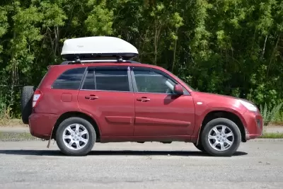 Автобокс на крышу Белый Turino Compact Аэродинамический от интернет-магазина AUTOBOKS.kz. 