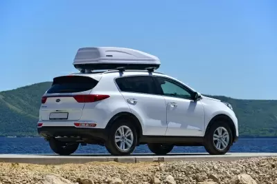 Автобокс на крышу PT-Group Аэродинамический "ACTIVE М" Белый ДВУСТОРОННЕЕ открывание от интернет-магазина AUTOBOKS.kz. 