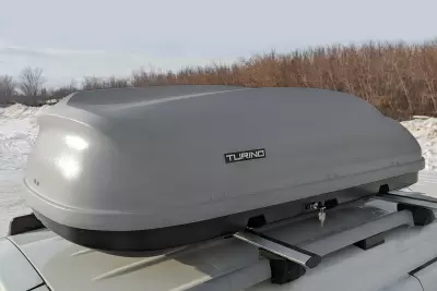Автобокс на крышу PT GROUP Аэродинамический "Turino 1" Серый ДВУСТОРОННЕЕ открывание 410л от интернет-магазина AUTOBOKS.kz. 