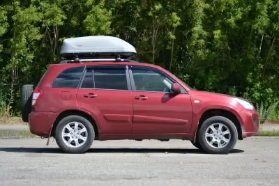 Автобокс на крышу Серый Turino Compact Аэродинамический от интернет-магазина AUTOBOKS.kz. 