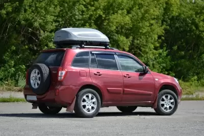 Автобокс на крышу Серый Turino Compact Аэродинамический от интернет-магазина AUTOBOKS.kz. 