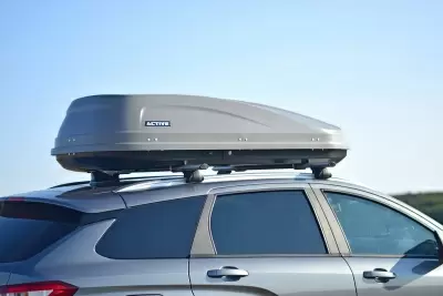 Автобокс на крышу PT-Group Аэродинамический "ACTIVE М" Серый ДВУСТОРОННЕЕ открывание от интернет-магазина AUTOBOKS.kz. 