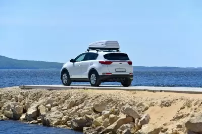 Автобокс на крышу PT-Group Аэродинамический "ACTIVE М" Белый ДВУСТОРОННЕЕ открывание от интернет-магазина AUTOBOKS.kz. 